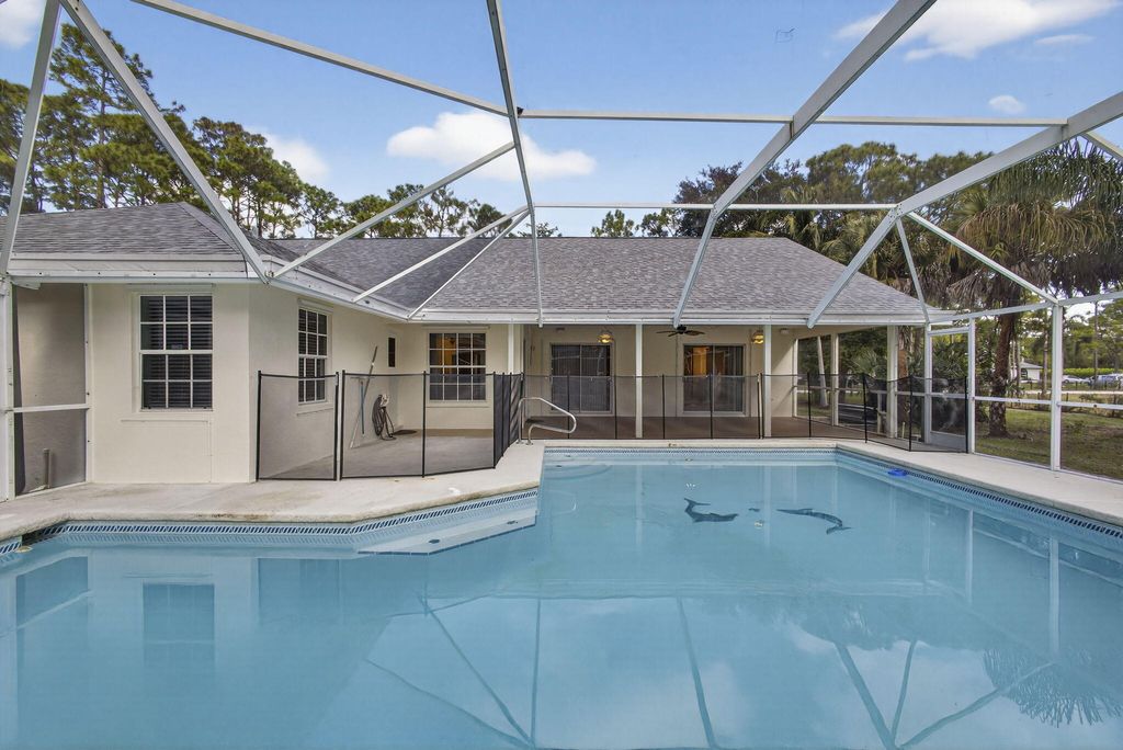 Photo of 15098 77th Place N, Loxahatchee, FL 33470 (MLS # R11147617)