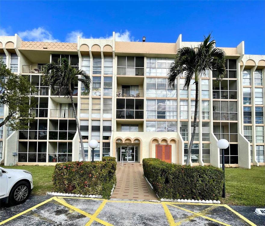 Beautifully remodeled condo in the highly desirable Three Islands neighborhood of Hallandale Beach! This unit has been completely updated with a brand-new kitchen featuring new appliances, modern cabinetry, sleek countertops, and a convenient pass-through to the dining area. Brand-new tile floors throughout and fresh paint give the apartment a clean, contemporary feel. Elegant French doors open to a versatile den, perfect for a home office, guest space, or additional sleeping area. Located in the sought-after DeSoto Park community offering a secure lobby with TV monitoring, waterfront pool, clubhouse, and tennis courts. Laundry room just steps from your door. Walk to the beach, shops, restaurants and park! A truly move-in ready unit in a prime location. This one will not last, call today!