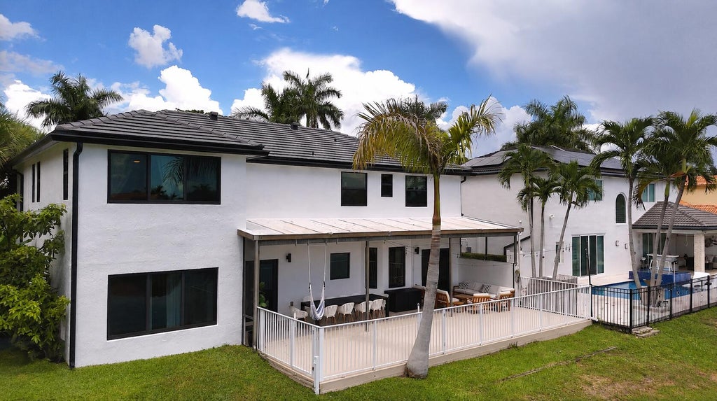 Photo of 10920 Haydn Drive, Boca Raton, FL 33498 (MLS # B26068968)