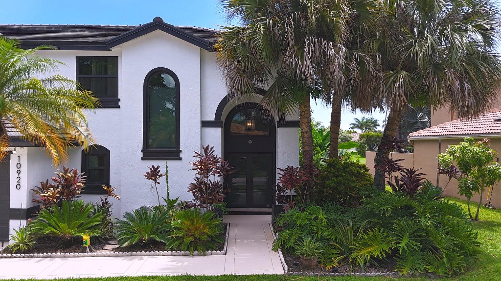 Photo of 10920 Haydn Drive, Boca Raton, FL 33498 (MLS # B26068968)