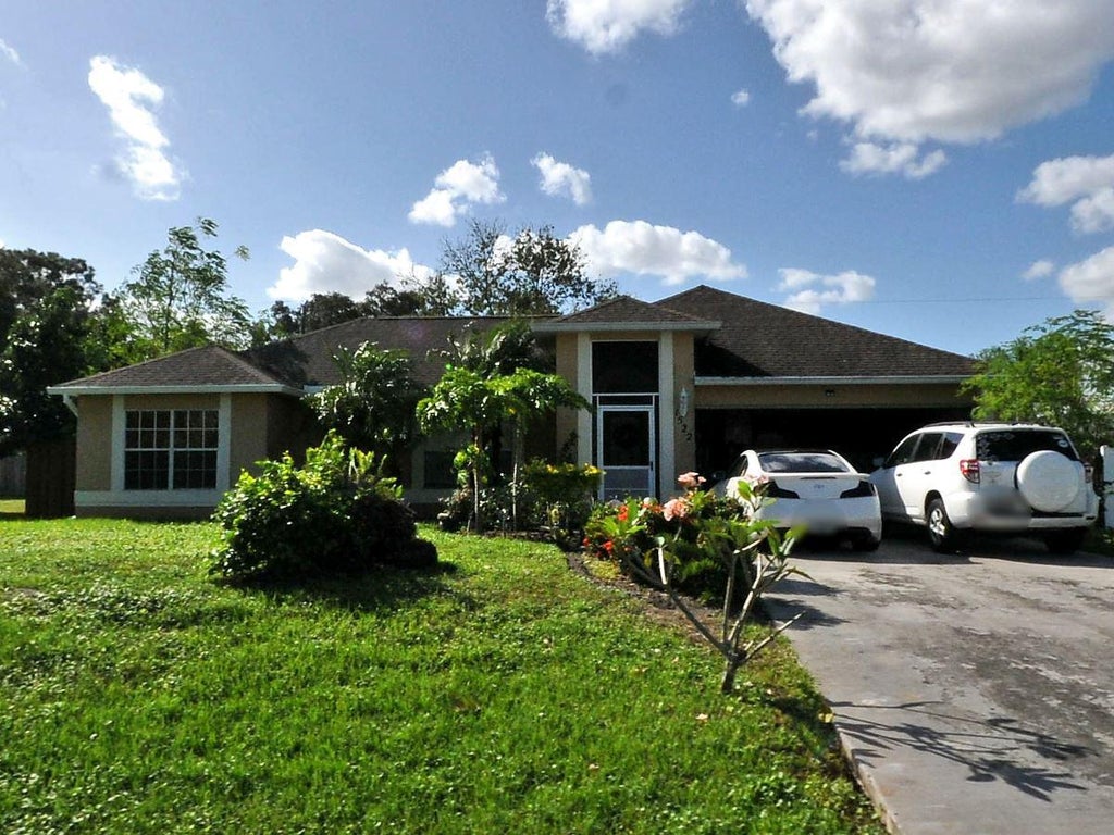 Photo of 1522 SW Aledo Lane, Port Saint Lucie, FL 34953 (MLS # R11052150)