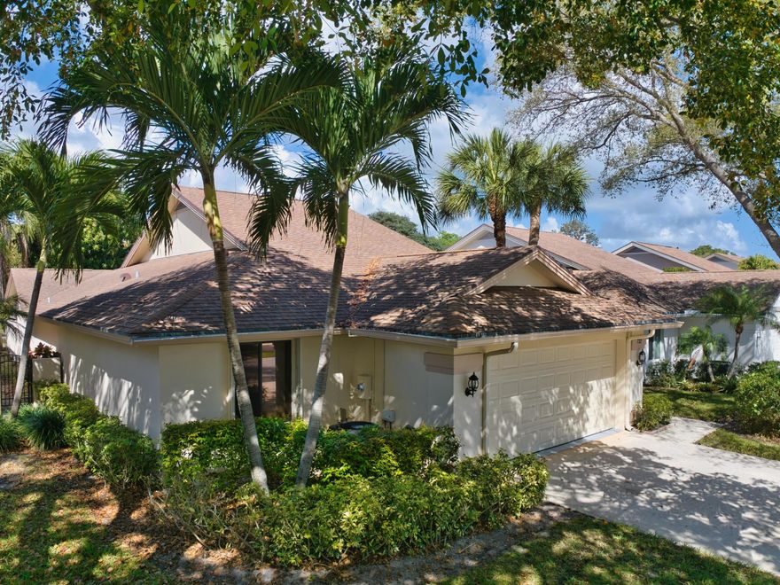 Paradise found in the River community of Jupiter! This beautifully remodeled 3BR/2BA pool home w/ a 2-car garage is just a short walk to the pristine beach. Bright and open with cathedral ceilings, the stunning kitchen features white wood-shake cabinetry, granite countertops, stainless appliances & microwave. Laminate flooring throughout with cozy carpeted bedrooms. A charming loft with spiral staircase is perfect for an office or hobby space. Enjoy the newly refreshed heated screened pool, ideal for laps, plus a 27' covered porch for relaxing or entertaining. Private preserve views back to a dog park. Spacious guest room, soaking tub in second bath & a luxurious master suite opening to the pool with dual sinks, tub & shower. Low HOA includes cable, front lawn care & resort-style amenities