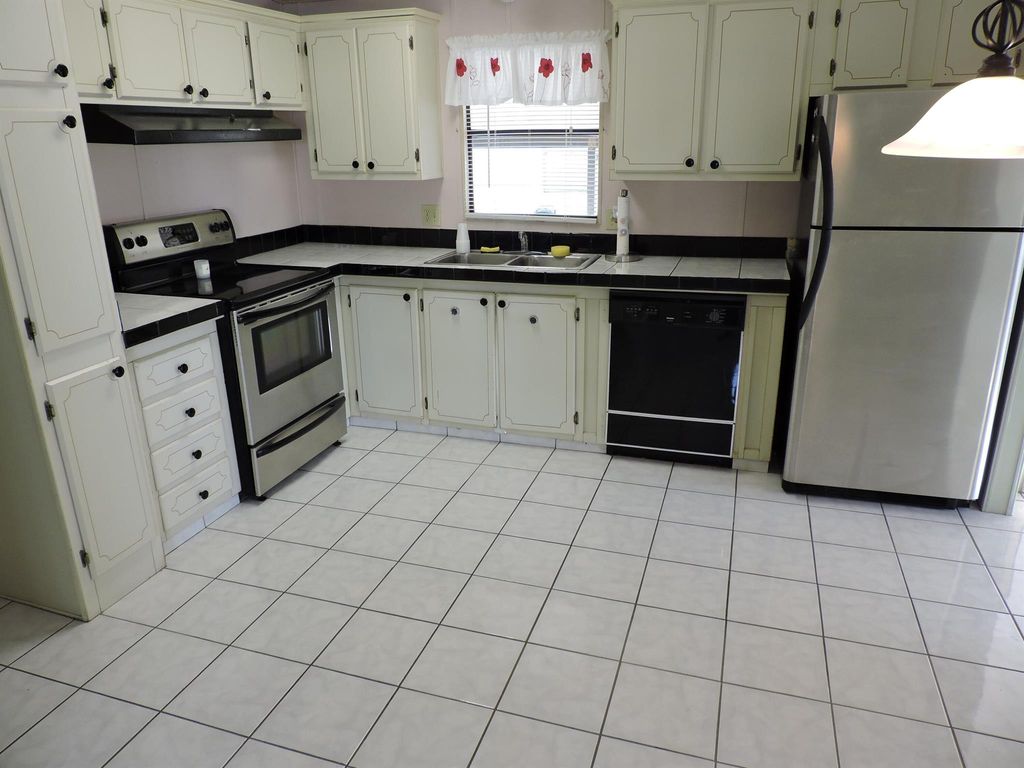 Photo of 4669 SE Tallowood Terrace, Stuart, FL 34997 (MLS # R11075573)