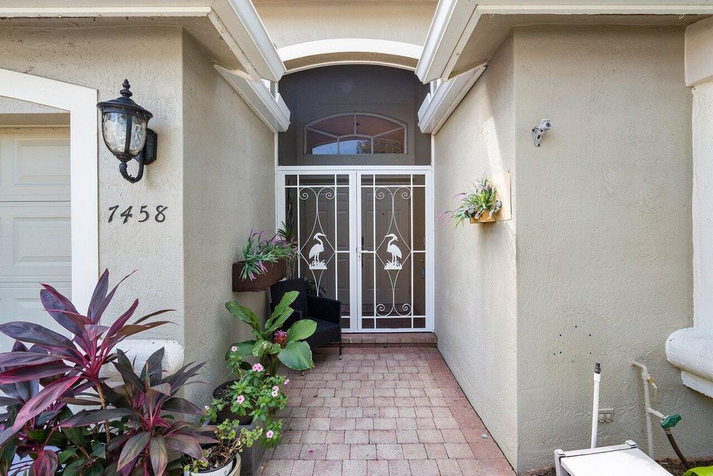 Photo of 7458 Viale Caterina, Delray Beach, FL 33446 (MLS # R10913063)