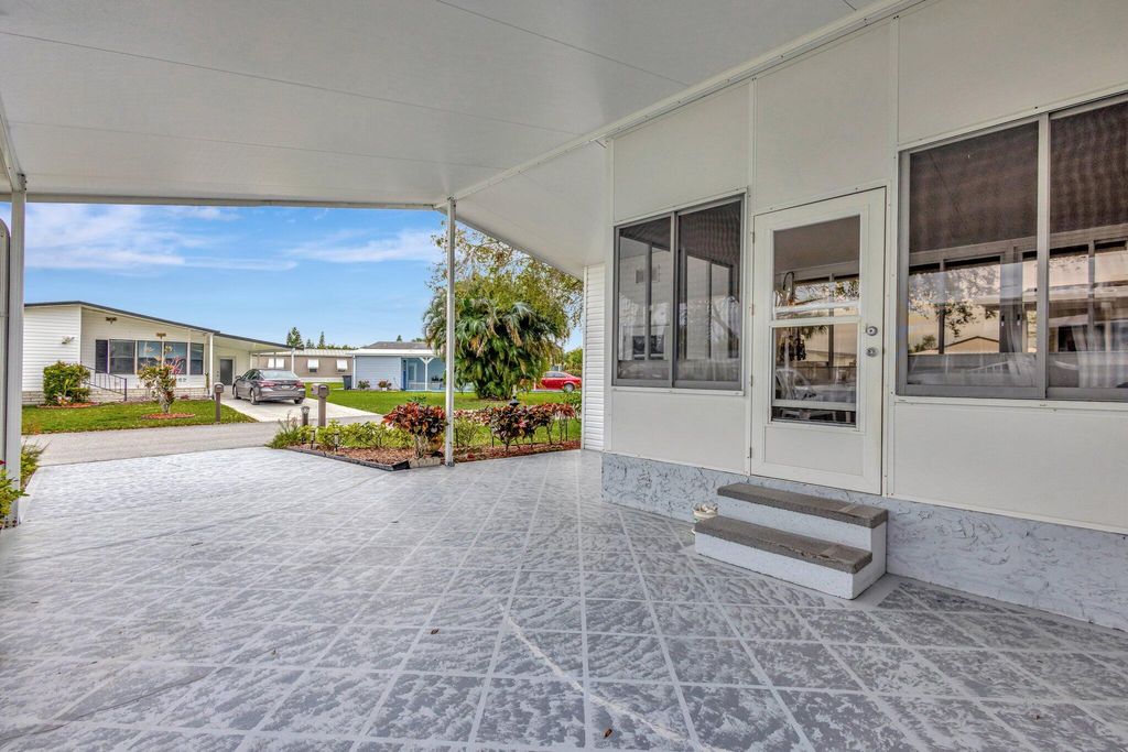 Photo of 14359 Cancun Avenue, Fort Pierce, FL 34951 (MLS # F10555423)
