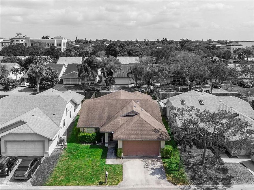 Enjoy a spacious floor plan on this 4 bedroom, 2 bathroom home, right in the heart of Coral Springs! On the outside, this home features a private, fenced-in backyard, with a pool, and an 8 year young roof. On the inside you will notice a beautifully upgraded kitchen with granite countertops, large bedrooms, large walk-in closet in the master bedroom, and an upgraded master bathroom with cabana door. The vaulted ceilings will remind you how much living space there is to enjoy. Take a stroll down the street to "The Walk" of Coral Springs and enjoy lots of restaurants, shopping, entertainment and local events. Very low HOA at only $90/yr with no restrictions and no approval process! Are you ready to make this home your own?