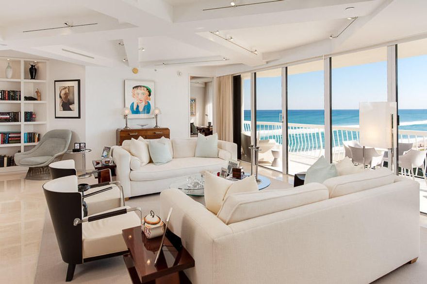 Spectacular Ocean to Intracoastal views are seen from this tastefully designed & meticulously renovated 2B/2.5B + den including prime poolside cabana. Situated on a high floor, 9' ceilings, w/ grand scaled rooms set in a neutral palette. A soft contemporary design features limestone flooring, open gourmet kitchen w/ top appliances, coffered ceilings w/ custom lighting, motorized window treatments, and stunning finishes throughout. Sought after direct oceanfront building offering 24/7 gatehouse, doormen, large pool w/ attendant, 6 clay tennis courts w/ pro, & fitness center. 2 garage spaces & double storage units. Nearby golf & The Four Seasons Resort. Ready for immediate enjoyment!