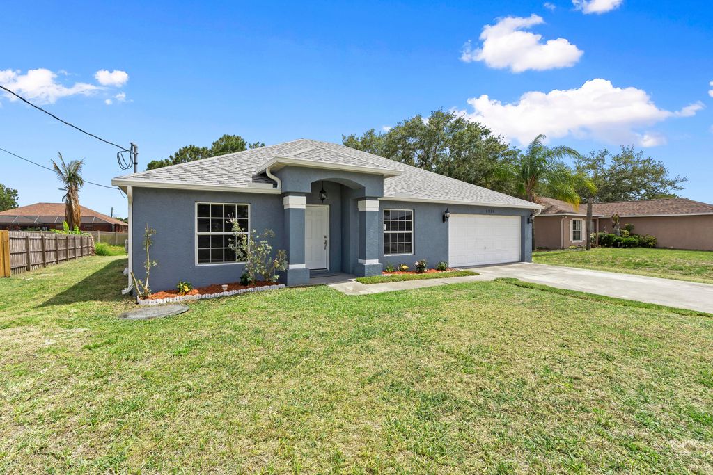 Photo of 1024 SW Estaugh Avenue, Port Saint Lucie, FL 34953 (MLS # B26025421)