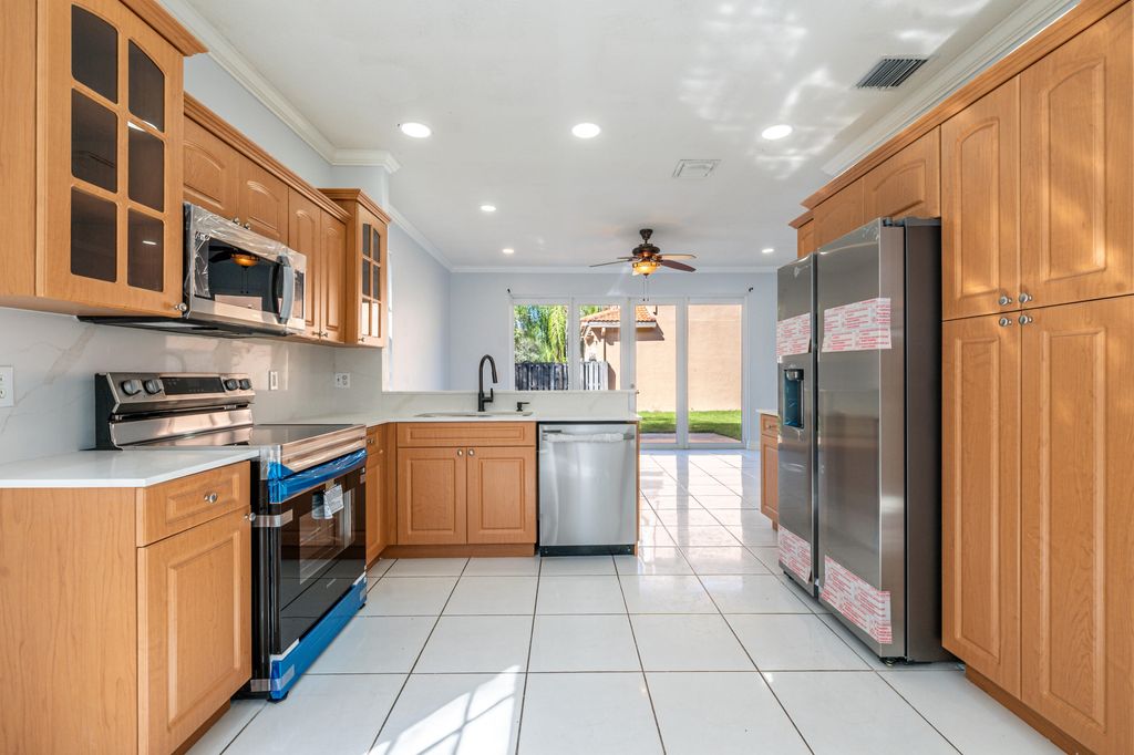 Photo of 2502 Ambassador Ave, Cooper City, FL 33026 (MLS # R11132005)