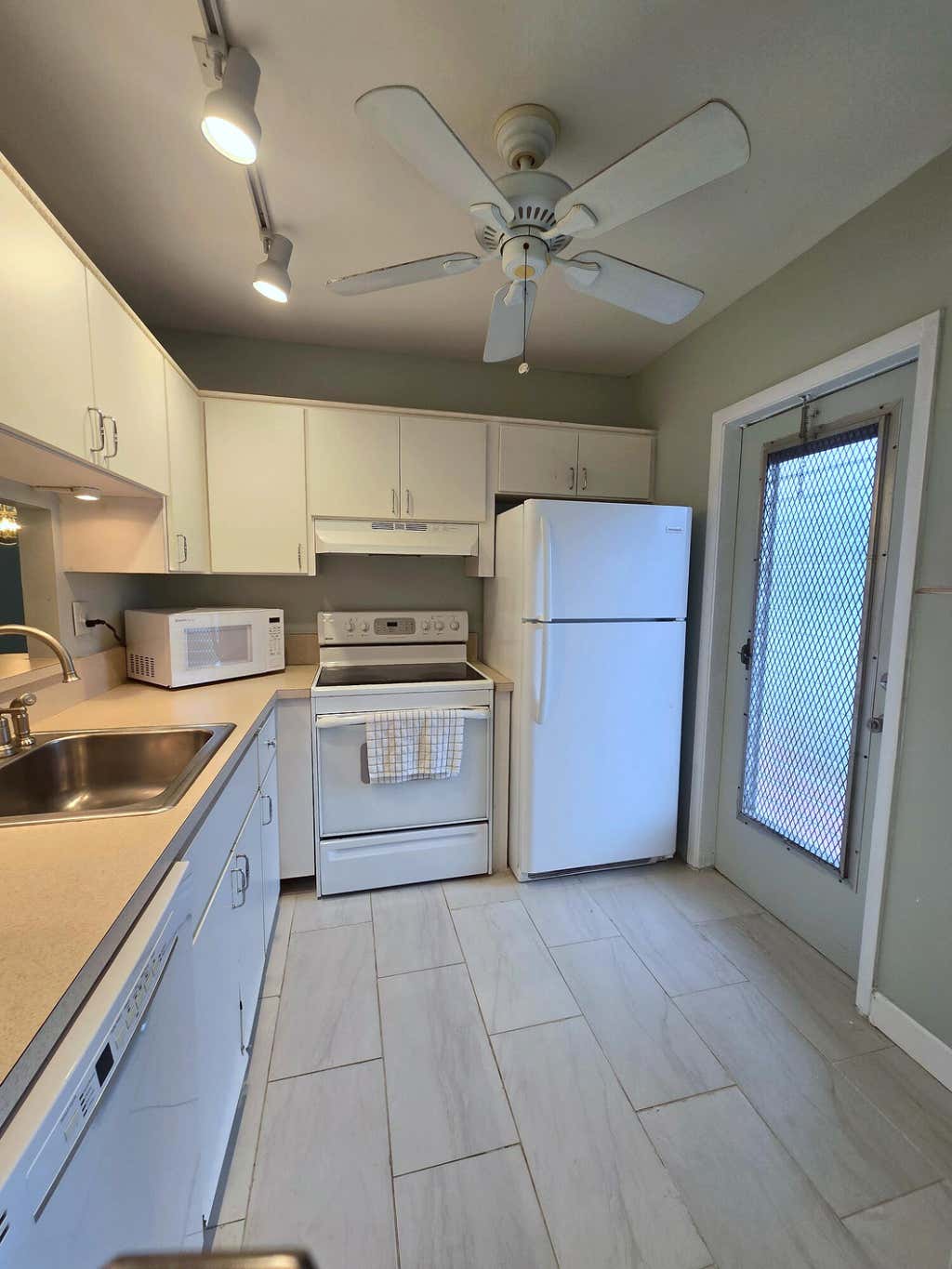 Photo of 5071 W OAKLAND PARK Boulevard #109, Lauderdale Lakes, FL 33313 (MLS # B26063782)