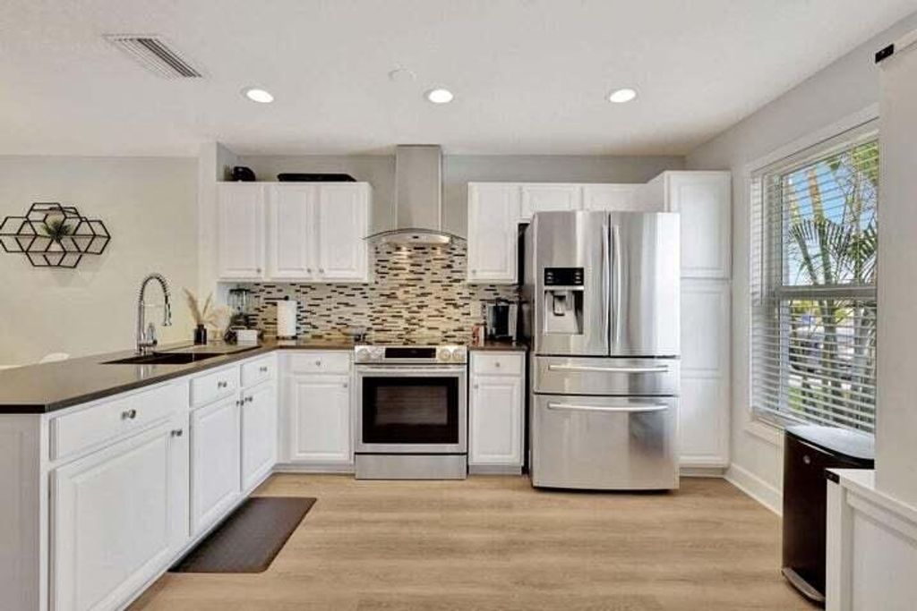 Photo of 143 Deerfield Drive, Jupiter, FL 33458 (MLS # R10984112)