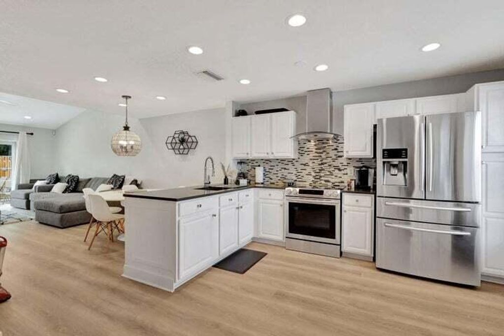 Photo of 143 Deerfield Drive, Jupiter, FL 33458 (MLS # R10984112)