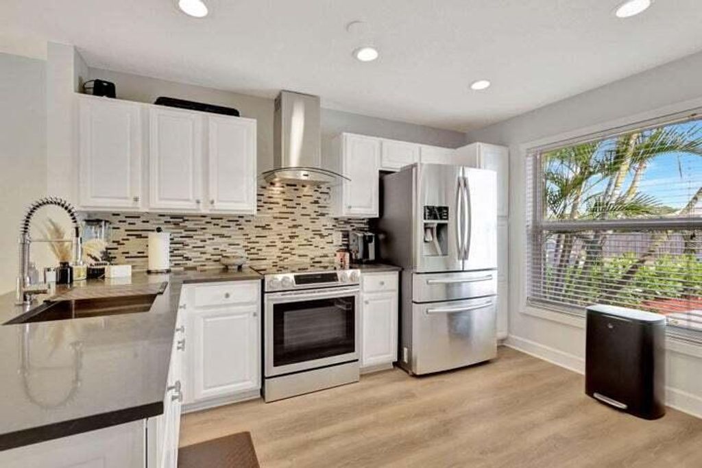 Photo of 143 Deerfield Drive, Jupiter, FL 33458 (MLS # R10984112)