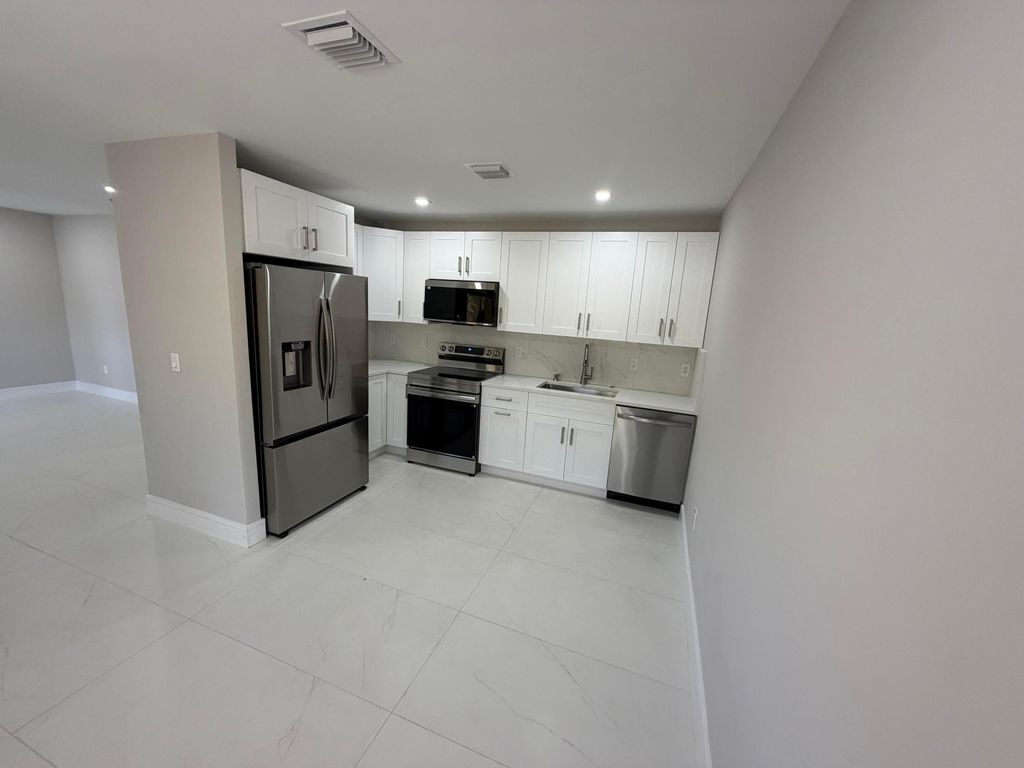 Photo of 4329 NW 4th Avenue #4329, Pompano Beach, FL 33064 (MLS # B26020561)