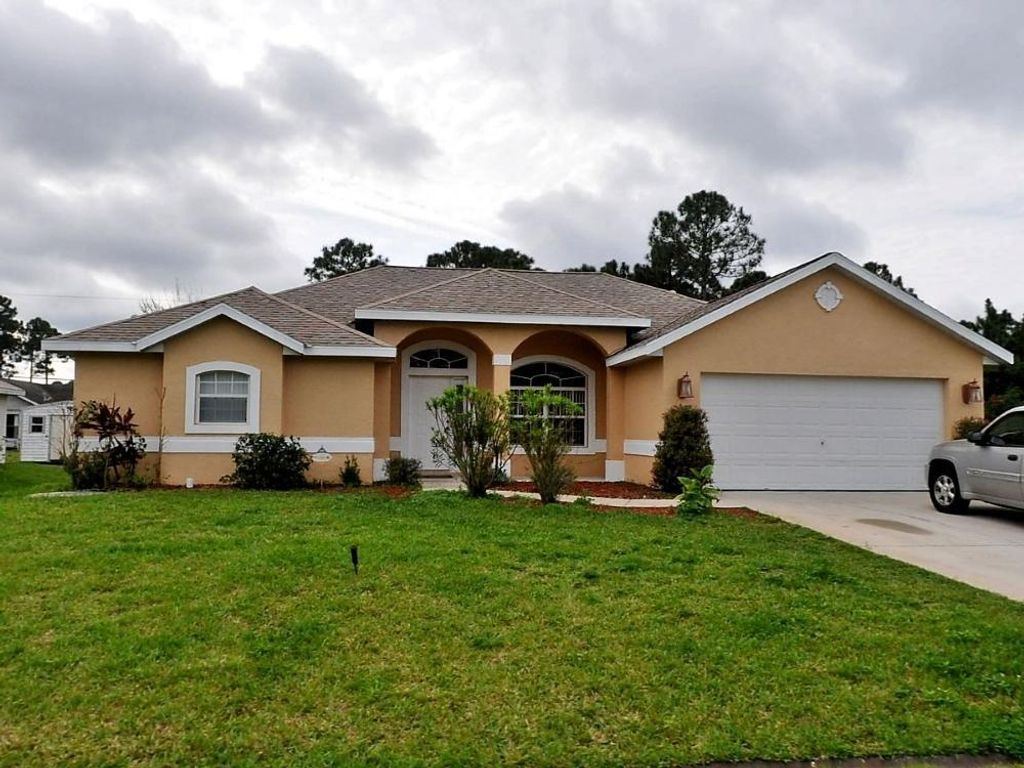 Photo of 1566 SW Flagami Road, Port Saint Lucie, FL 34953 (MLS # R10763747)