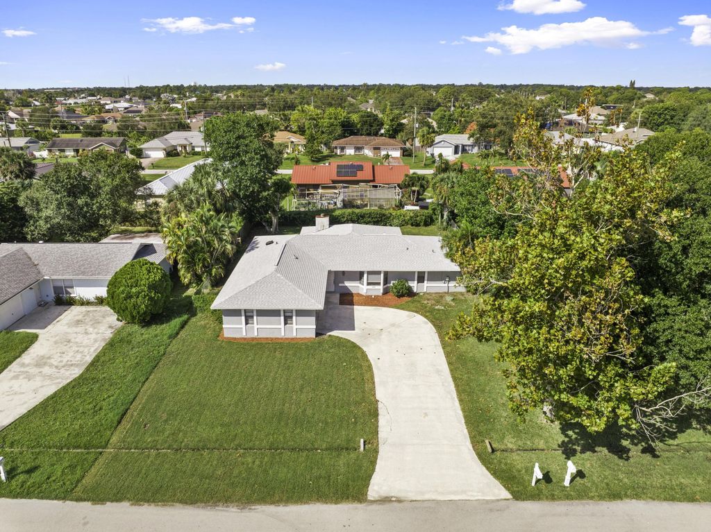 Photo of 2316 SW Lejune Street, Port Saint Lucie, FL 34953 (MLS # R11141878)