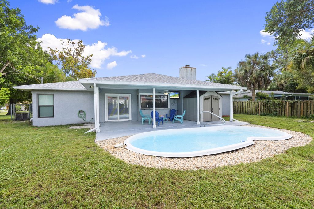 Photo of 2316 SW Lejune Street, Port Saint Lucie, FL 34953 (MLS # R11141878)