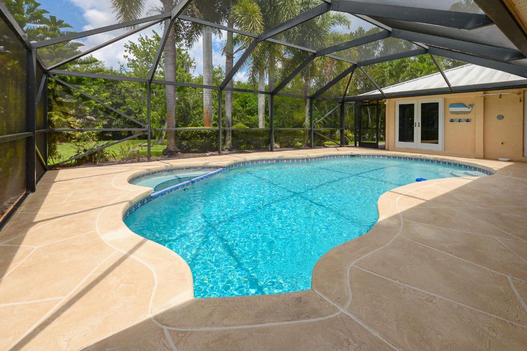 Photo of 2610 SE Erickson Drive, Port Saint Lucie, FL 34984 (MLS # R11093468)