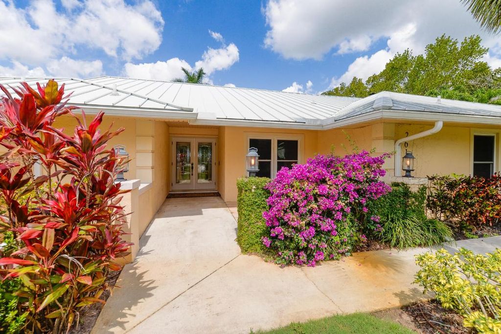 Photo of 2610 SE Erickson Drive, Port Saint Lucie, FL 34984 (MLS # R11093468)