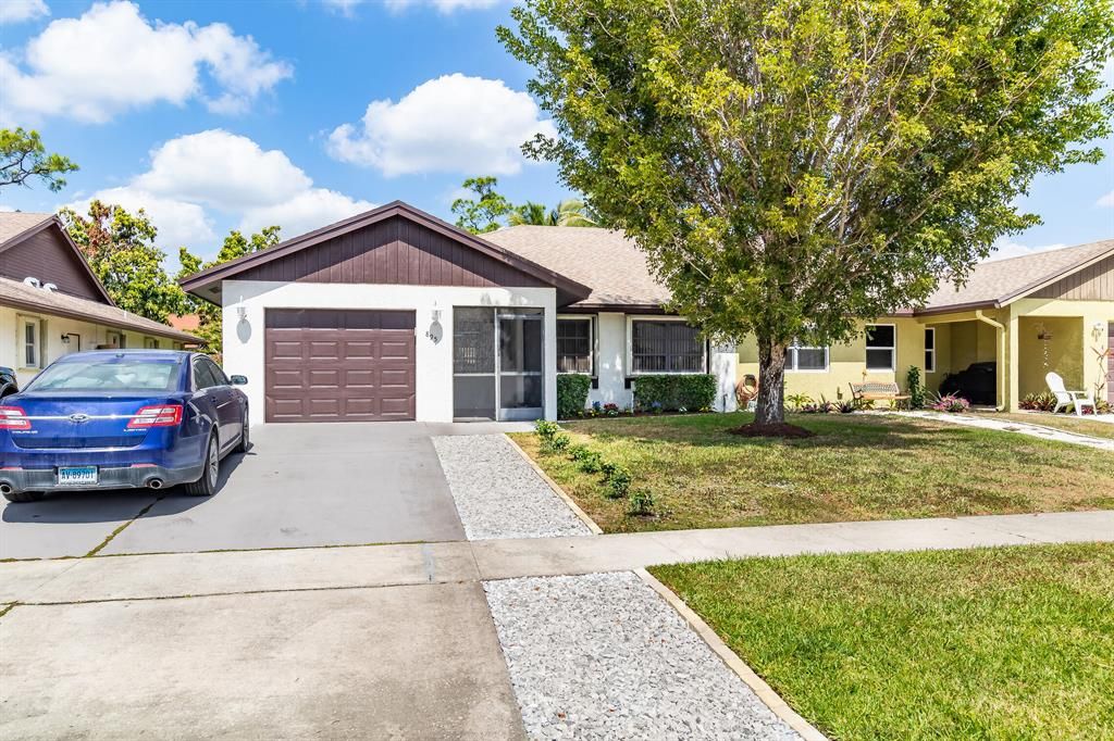 Photo of 895 Lantern Tree Lane, Wellington, FL 33414 (MLS # R10873783)