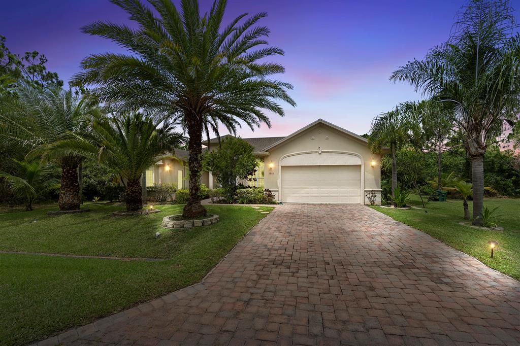 Photo of 5568 NW Wesley Road, Port Saint Lucie, FL 34986 (MLS # R10735452)