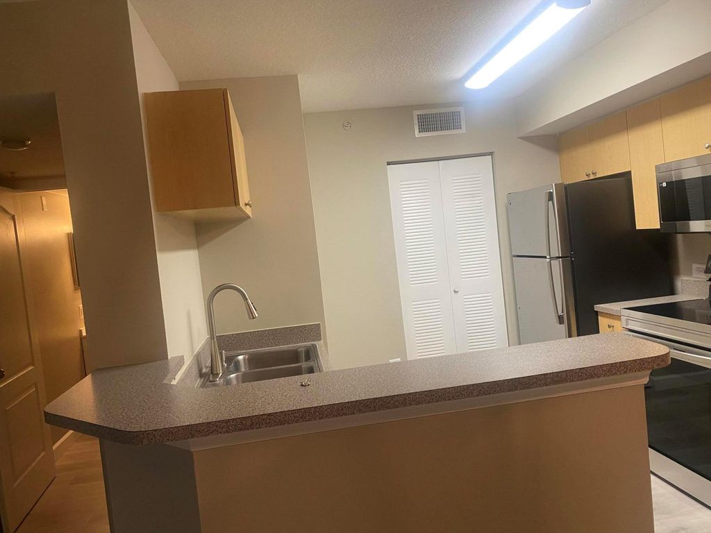 Photo of 1304 Villa Circle #1304, Boynton Beach, FL 33435 (MLS # R11079210)