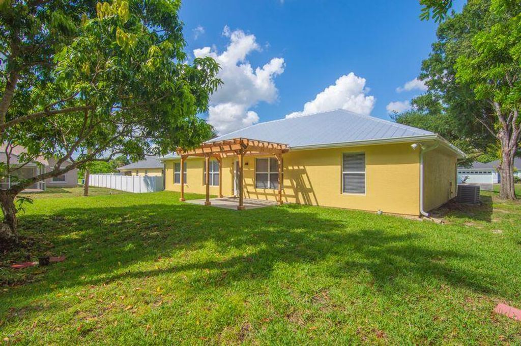 Photo of 1590 Polynesian Lane, Sebastian, FL 32958 (MLS # R11111871)