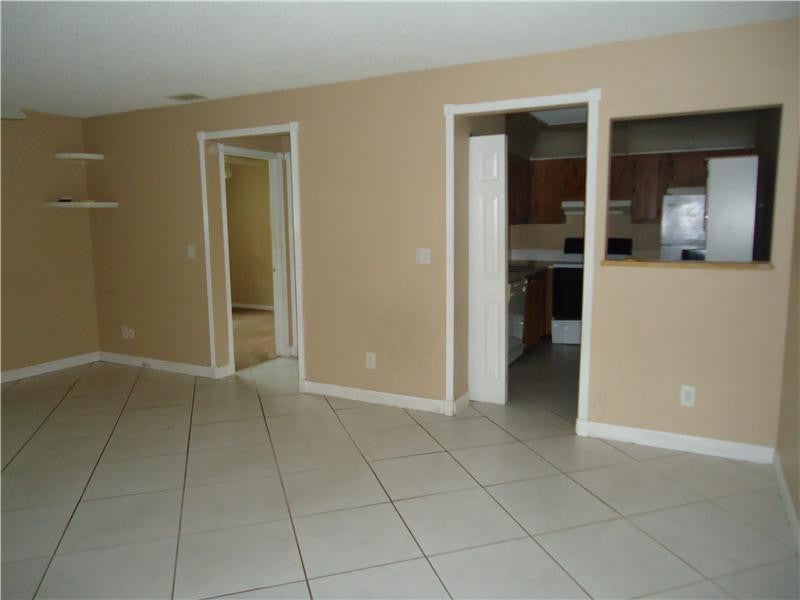 Photo of 10750 ROYAL PALM Boulevard #6-4, Coral Springs, FL 33065 (MLS # B26091404)