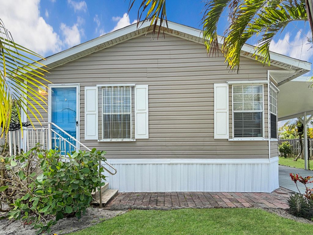 Photo of 7568 SE Swan Avenue, Hobe Sound, FL 33455 (MLS # B26016483)