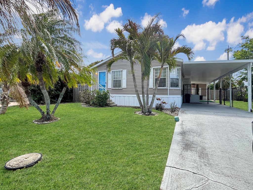 Photo of 7568 SE Swan Avenue, Hobe Sound, FL 33455 (MLS # B26016483)