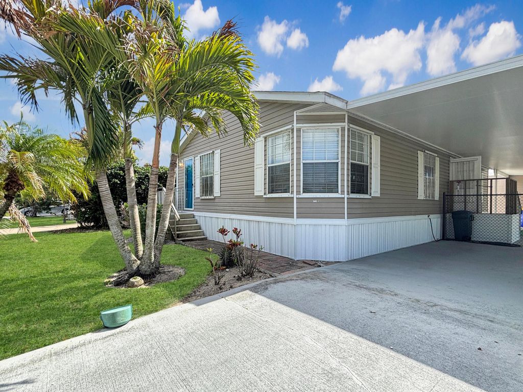 Photo of 7568 SE Swan Avenue, Hobe Sound, FL 33455 (MLS # B26016483)