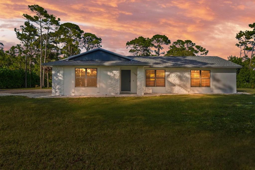 Photo of 17493 41st Road N, The Acreage, FL 33470 (MLS # R11142064)