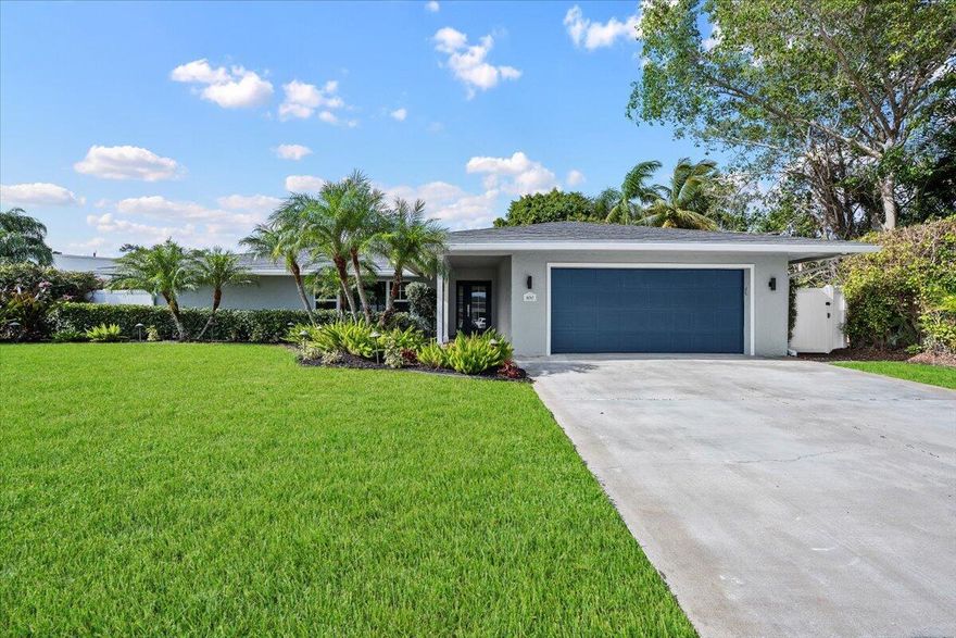 Welcome to this stunning 3-bedroom, 2-bath home with a 2-car garage, perfectly situated on a desirable corner lot in the heart of Jupiter, Florida. This home truly has it all, featuring a beautifully updated kitchen with white shaker cabinets, quartz countertops, a designer marble backsplash, and premium Bosch appliances. Wide-plank luxury vinyl wood flooring flows throughout, creating a seamless and modern feel. Both bathrooms have been thoughtfully renovated with high-end finishes and the finest details. Enjoy cozy evenings by the wood-burning fireplace or relax and entertain on the expansive patio. Located just minutes from Jupiter's best restaurants, shopping, the beach, and the Intracoastal. NO HOA--bring your boat, your toys, and embrace the ultimate Jupiter lifestyle.