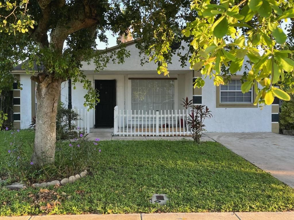 Photo of 10705 Aquarius Lane, Royal Palm Beach, FL 33411 (MLS # R11130782)