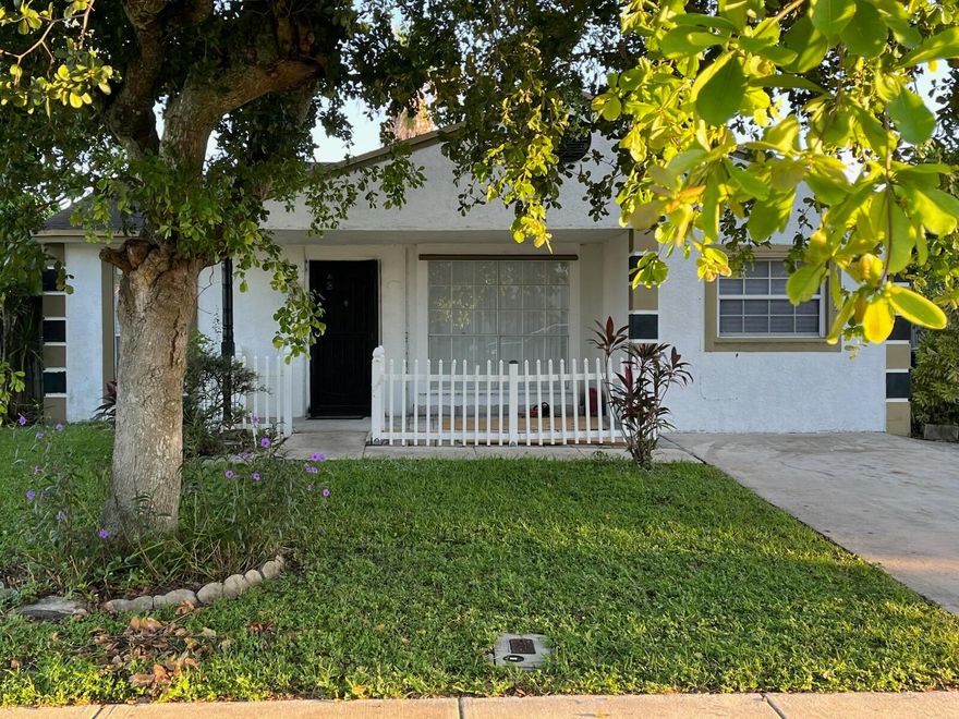 Charming 2-bedroom starter home in the heart of Royal Palm Beach! This move-in-ready gem features a new A/C and fresh interior paint throughout. Includes a versatile flex room converted from the original 1-car garage—ideal for an office, guest room, or play area. Enjoy an open layout with vaulted ceilings and a spacious fenced backyard perfect for relaxing or entertaining. Located in desirable Counterpoint Estates with NO HOA and close to parks, schools, shopping, and dining. 2 solar security cameras come with this home.  LOCATION, LOCATION, LOCATION...a great opportunity for first-time buyers or anyone looking to downsize! Equal Housing Opportunity.
