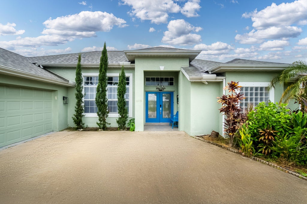 Photo of 6715 NW PINSON Court, Port Saint Lucie, FL 34983 (MLS # B26065827)