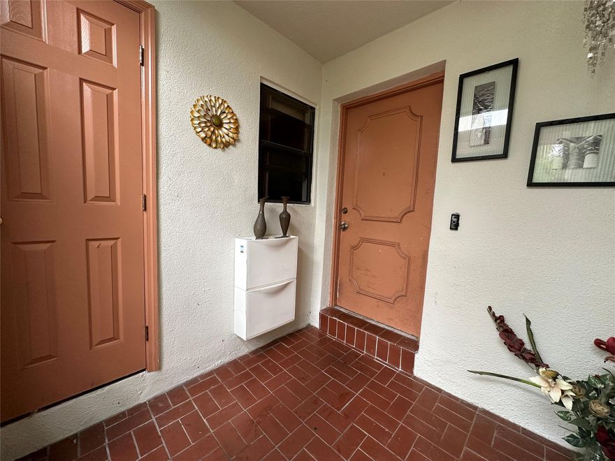 Beautifully updated 2-bedroom, 2.5-bath townhouse located in a secure, gated community. This home features a renovated kitchen with granite countertops, stainless steel appliances, and newer cabinetry, along with tastefully updated bathrooms. Tile flooring spans the main level, while laminate flooring enhances the upstairs living areas.

A bonus enclosed Florida room adds valuable, air-conditioned living space—perfect for a home office or relaxation area. Additional highlights include an in-unit washer and dryer and covered parking.