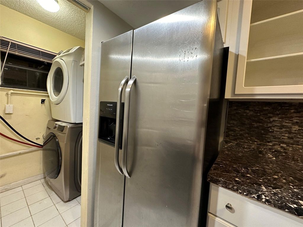 Photo of 6630 Racquet Club Dr #163, Fort Lauderdale, FL 33319 (MLS # F10542353)