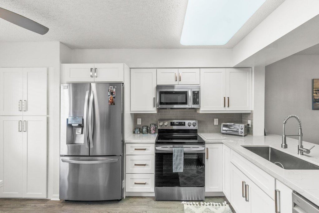 Photo of 6037 Pointe Regal Circle #408, Delray Beach, FL 33484 (MLS # R10971112)