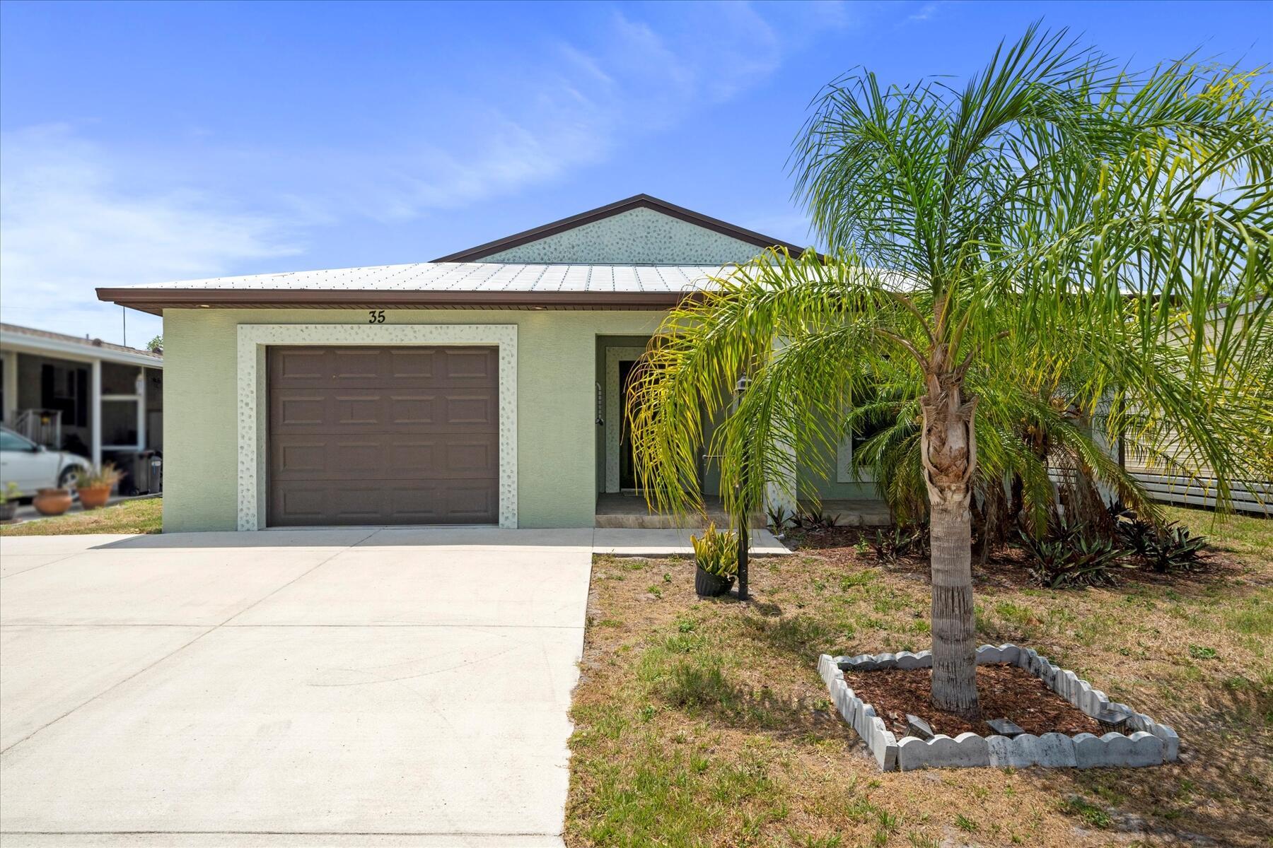 Welcome to this delightful 2 bedroom, 2 bath home located in the 55+ community of Spanish Lakes One. This home is immaculate and offers a comfortable lifestyle for those seeking tranquility with its large open concept living and close location to shops, beach and hospitals. Enjoy resort like amenities in this beautiful quiet community. Monthly lot rent is only $595.63 and includes lawn maintenance, trash removal, recycling and all the amenities of the HOA such as unlimited golfing, swimming pools, exercise room, billiards and so much more! Whether you are downsizing or looking for an investment property, this home is a solid choice. Call today to schedule your viewing.