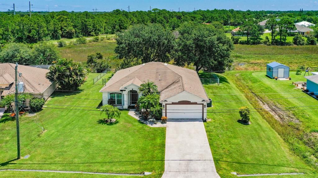 Photo of 6487 NW Groveland Terrace, Port Saint Lucie, FL 34953 (MLS # R10732396)