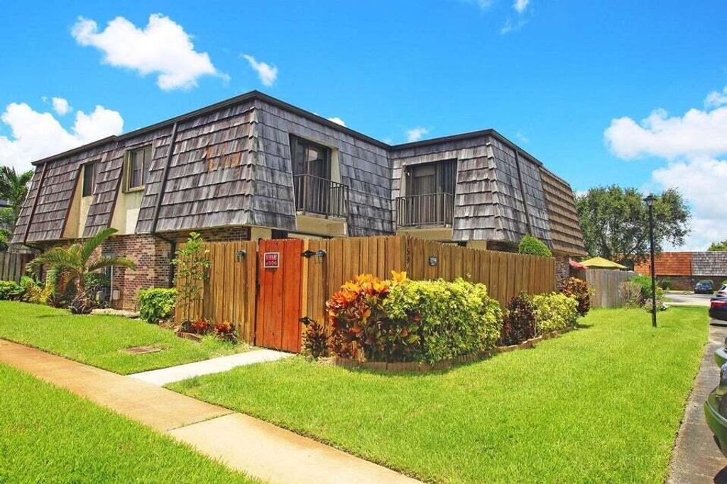 Photo of 1594 Forest Lakes Circle #C, West Palm Beach, FL 33406 (MLS # R11076843)