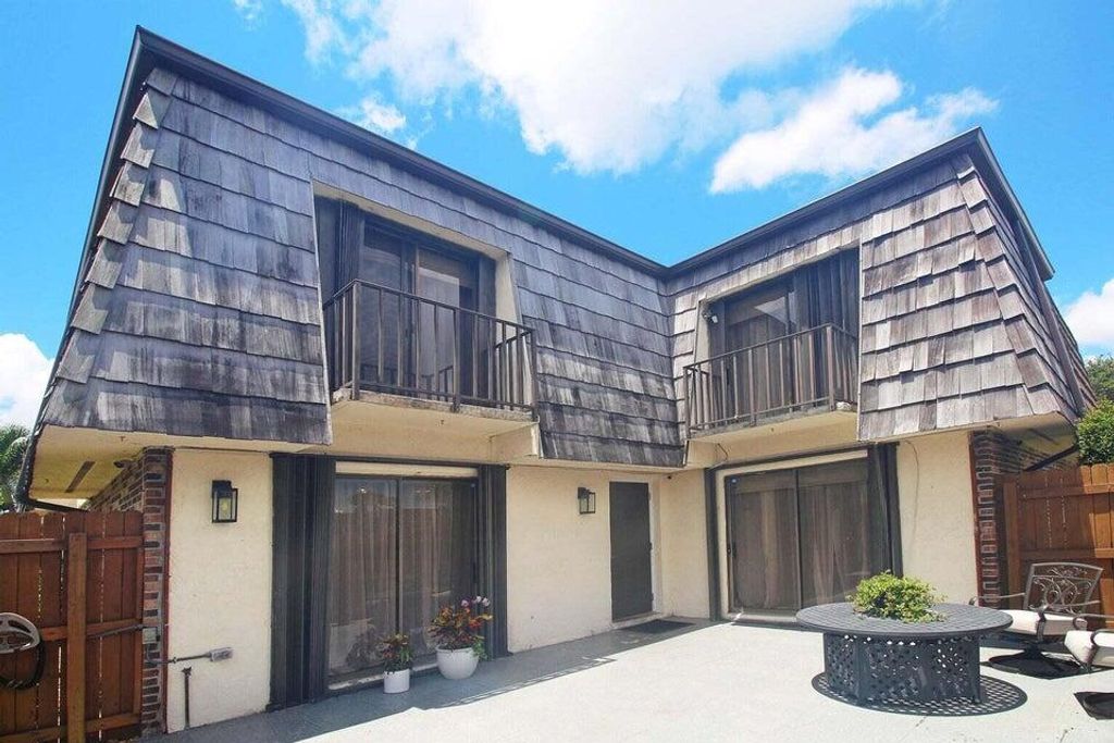 Photo of 1594 Forest Lakes Circle #C, West Palm Beach, FL 33406 (MLS # R11076843)