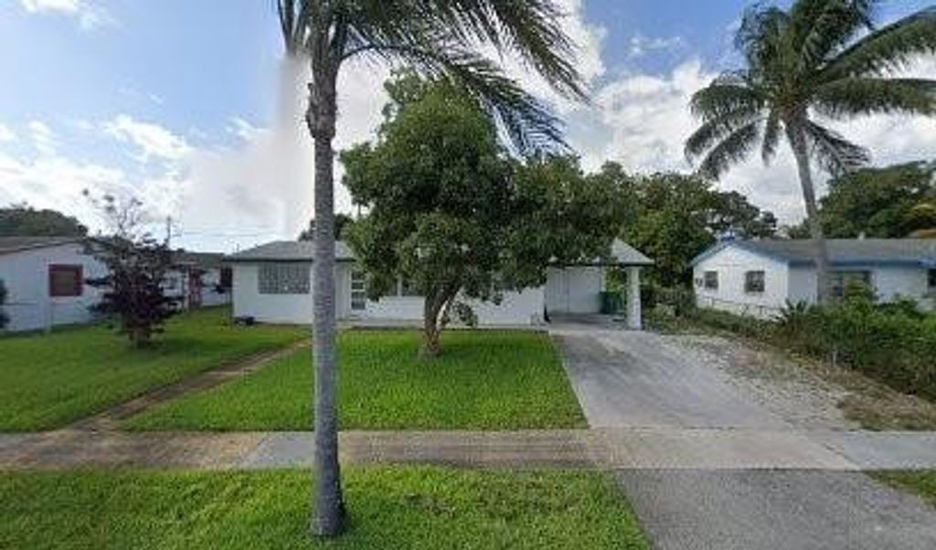 Photo of 241 W 20th Street, Riviera Beach, FL 33404 (MLS # F10555795)