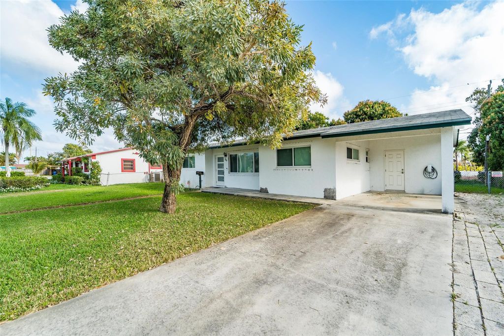 Photo of 241 W 20th Street, Riviera Beach, FL 33404 (MLS # F10555795)