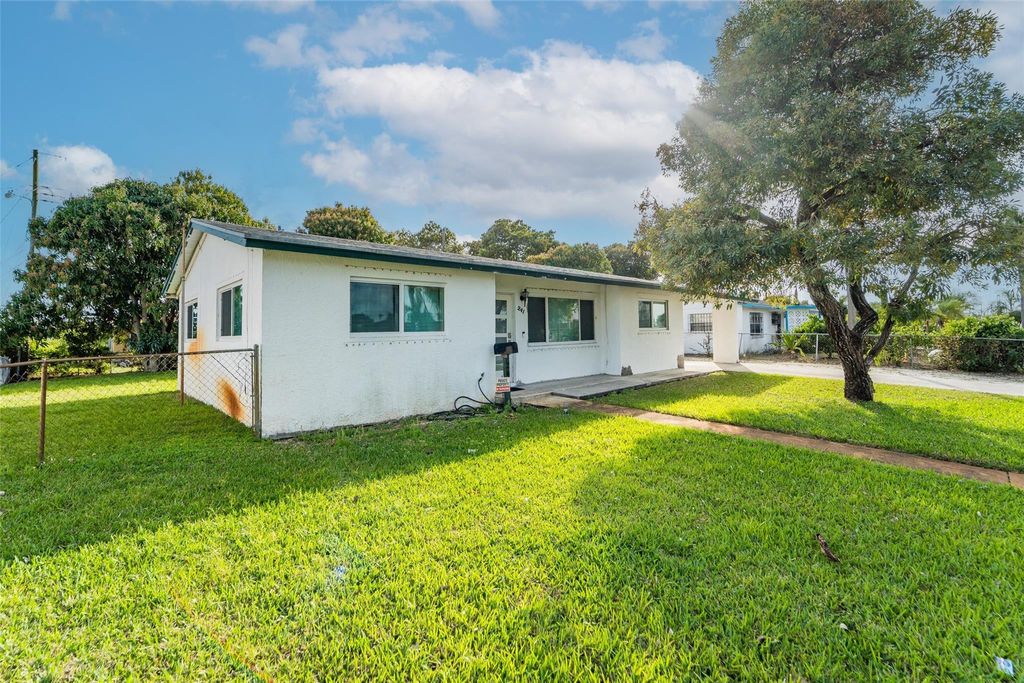 Photo of 241 W 20th Street, Riviera Beach, FL 33404 (MLS # F10555795)