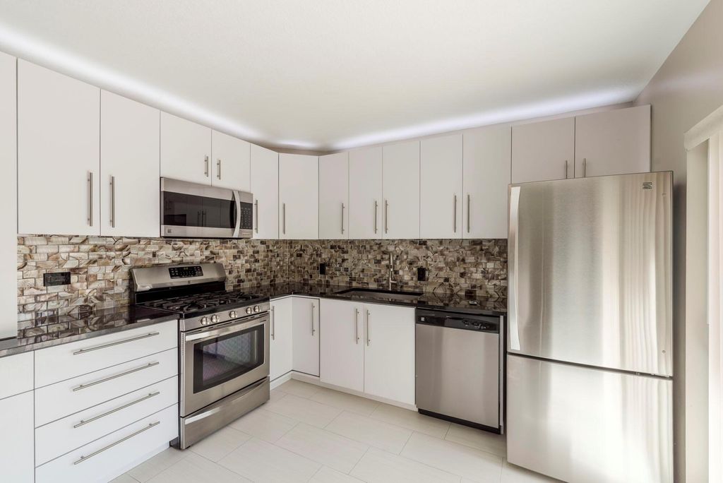 Photo of 1107 11th Lane, Palm Beach Gardens, FL 33418 (MLS # R10910818)