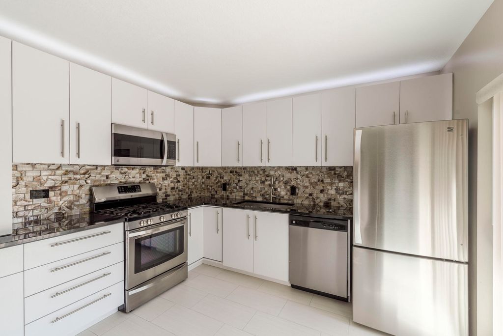 Photo of 1107 11th Lane, Palm Beach Gardens, FL 33418 (MLS # R10910818)