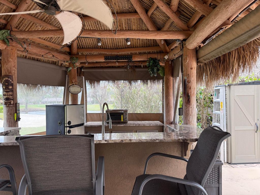 Photo of 419 NW Chipshot Lane, Port Saint Lucie, FL 34986 (MLS # B26014286)