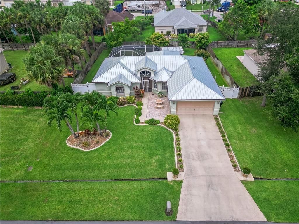 Photo of 2550 SW Dawn Street, Port Saint Lucie, FL 34953 (MLS # F10488363)